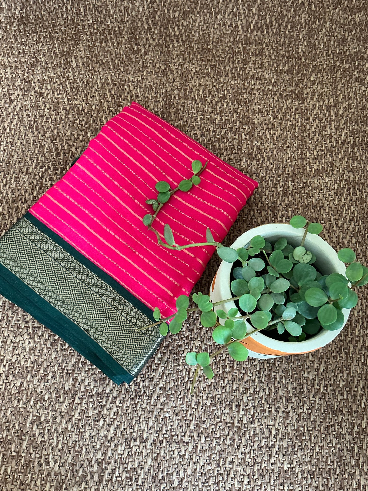 Reddish pink Chiffon saree with green border