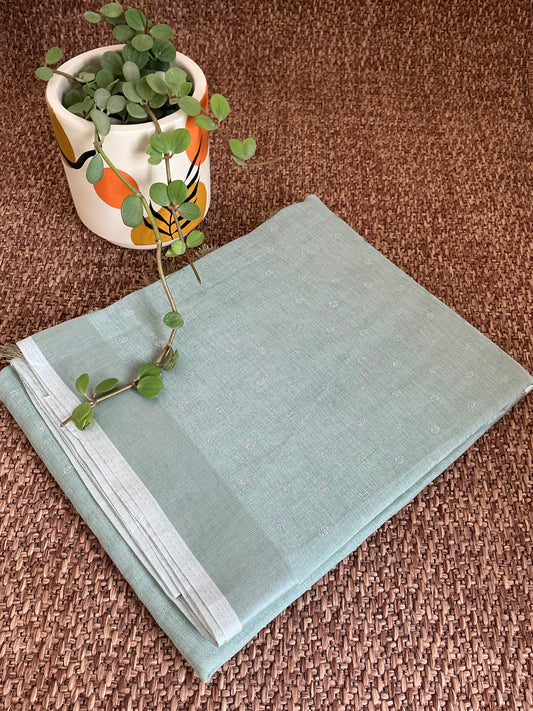 Light green Linen cotton  with silver motifs