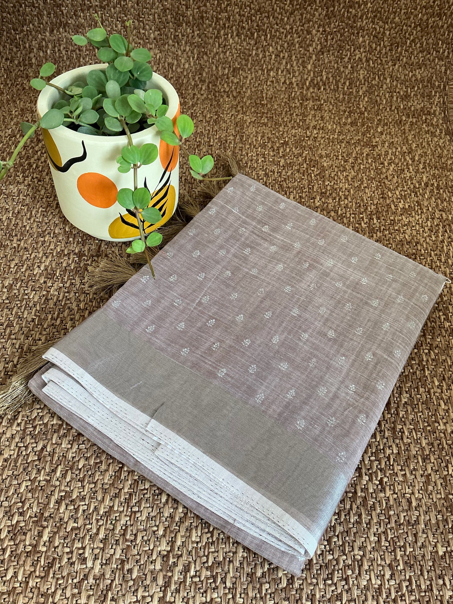 Brown linen cotton saree with silver motifs