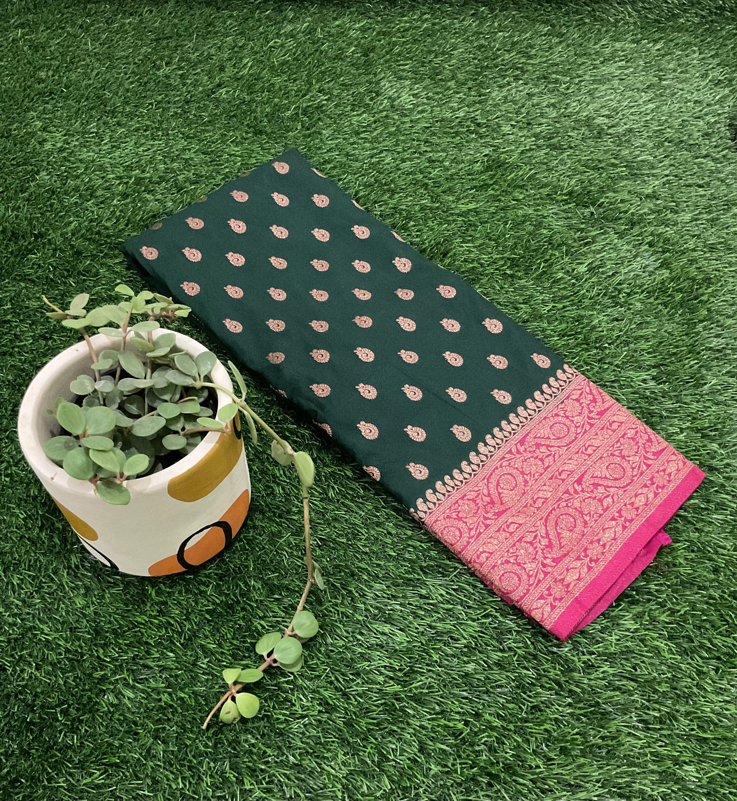 Dark green with pink  mango border Banarasi crepe georgette saree