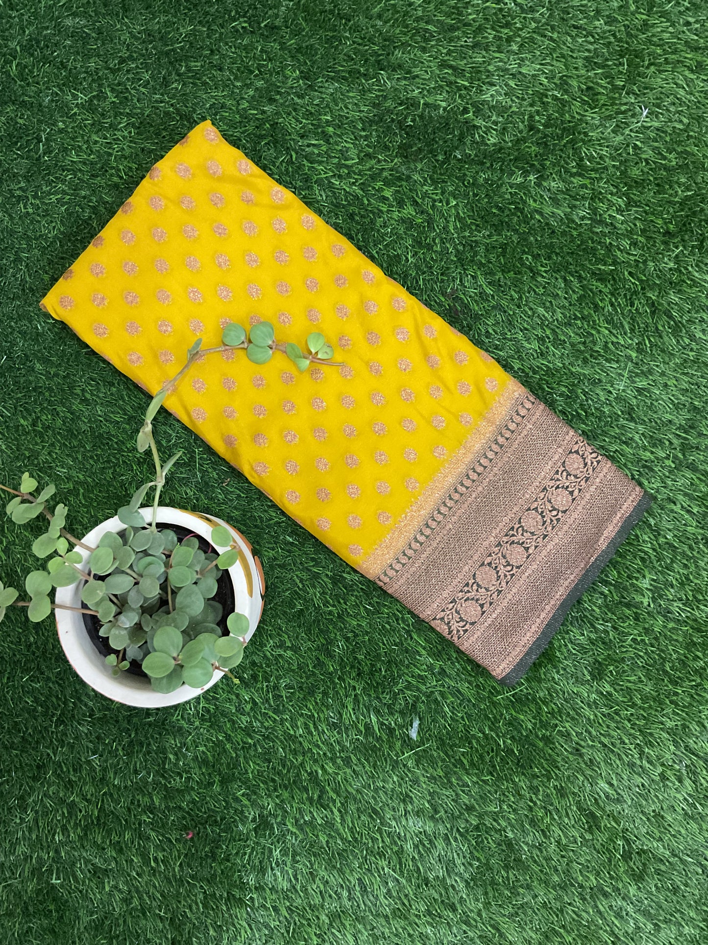 Lemon yellow Banarasi crepe georgette saree