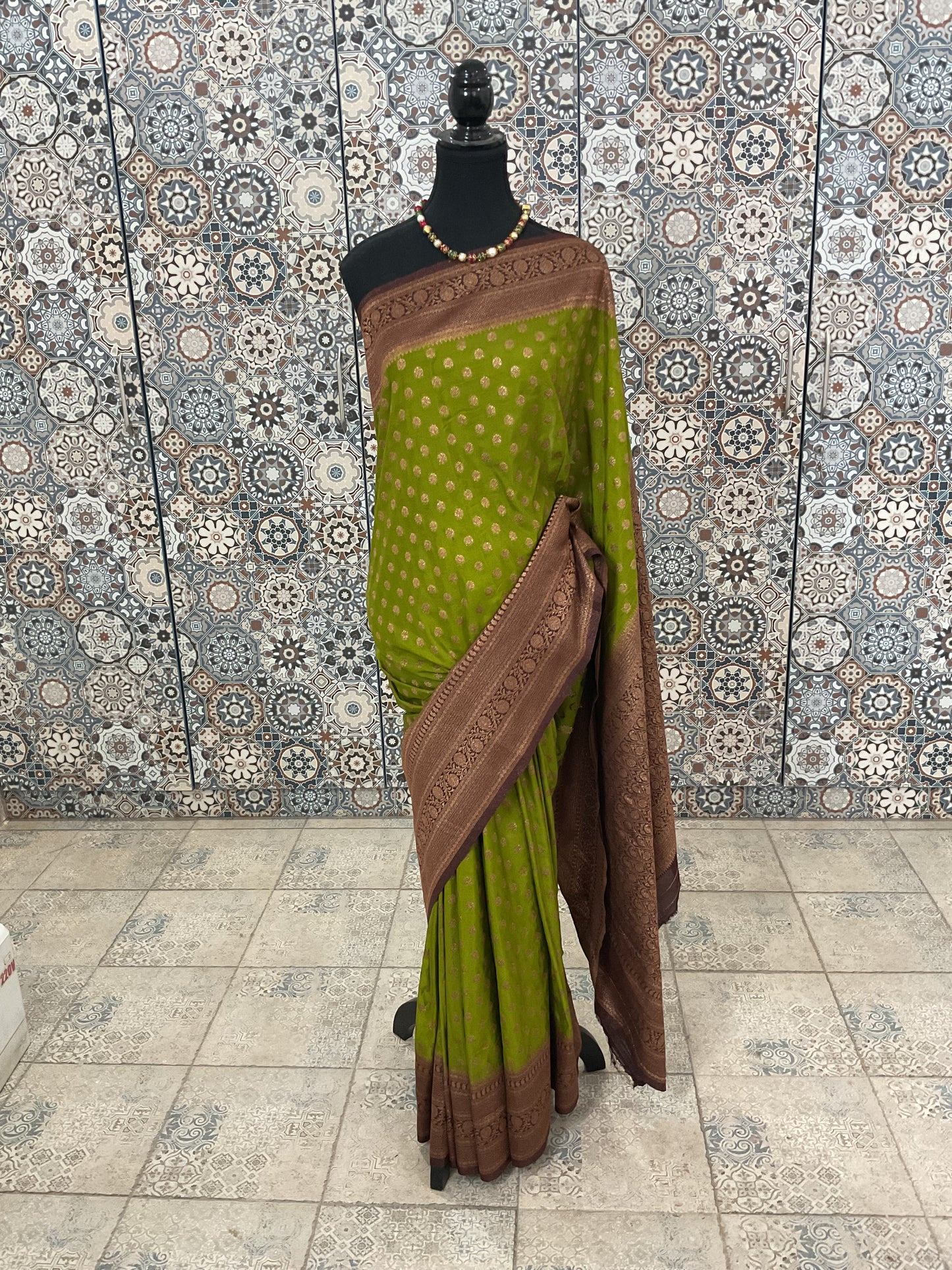 Banarasi crepe silk saree(Green with brown border)