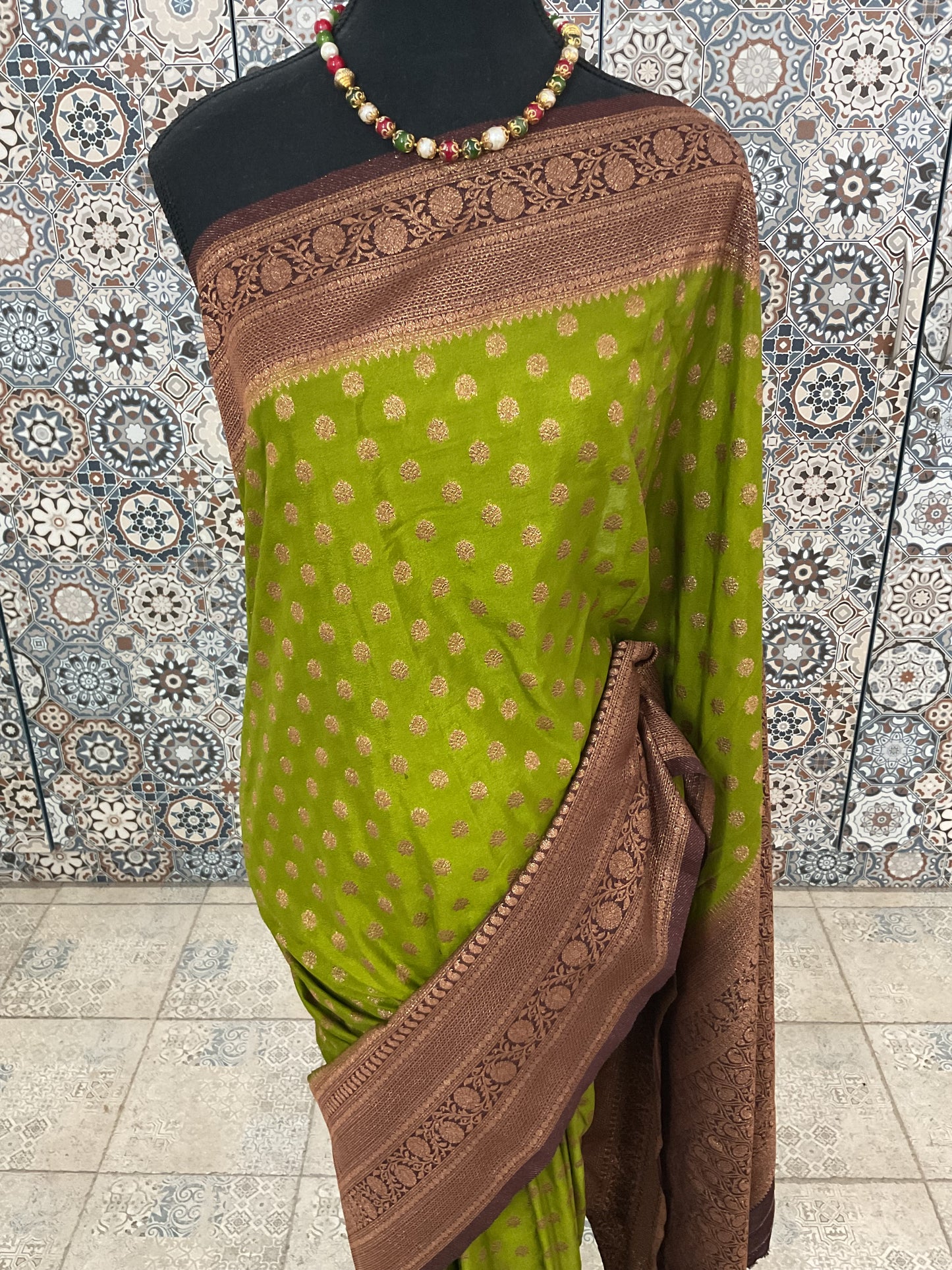 Banarasi crepe silk saree(Green with brown border)