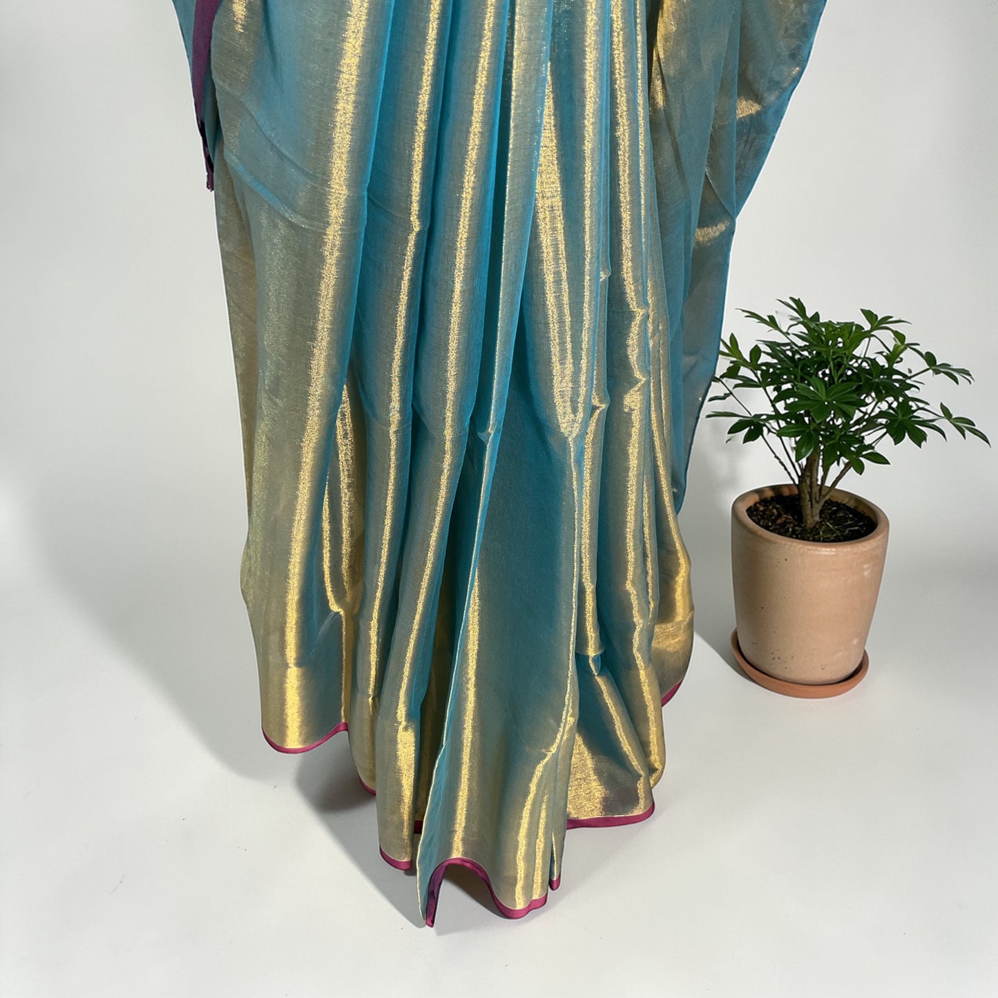 Khadi Tissue saree(Teal green with Rani pink border)